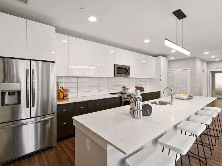 Gorgeous apartment kitchen in Wynnewood, PA with stainless steel appliances and white countertops
